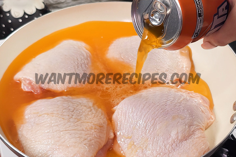 Chicken thigh in orange soda sauce